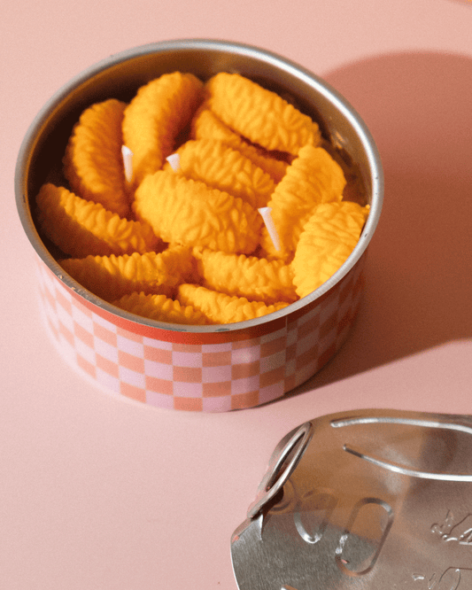 Vela en lata de mandarina