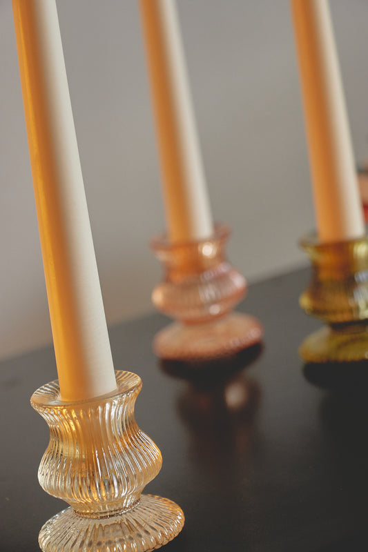 Candelabro con vela