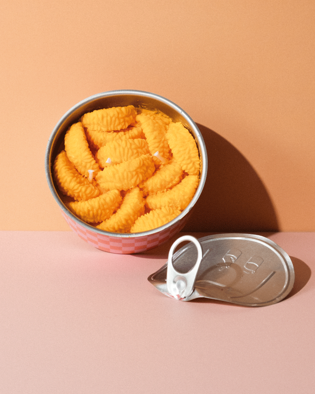 Vela en lata de mandarina